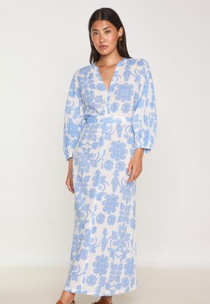 Maxi dress in light fabric with blue floral pattern. Features a V-neck, long sleeves, and cinched waistline. Smooth texture, relaxed fit.