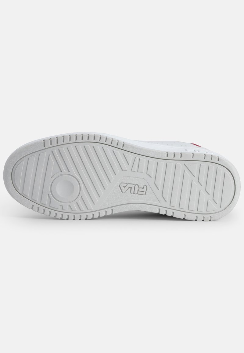 Suela de zapato de goma blanca con un patrón de textura en el dibujo, que presenta un detalle circular y el logotipo de "Fila" en el centro.