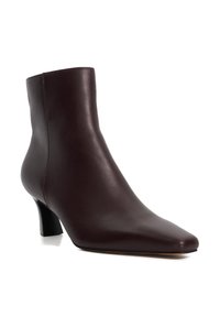 Burgundy leather ankle boot with a pointed toe, polished finish, and a mid-height block heel. Smooth texture with minimalistic design.