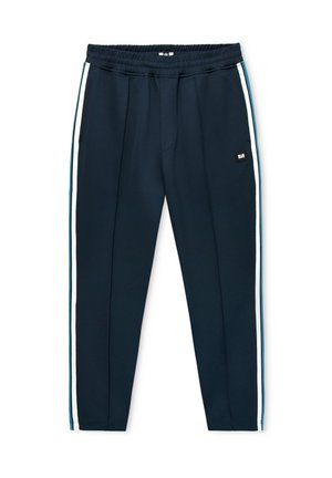 Pantalon de survêtement bleu marine avec taille élastique, bandes latérales blanches et bleu sarcelle, poches avant et petit patch logo noir et blanc sur la jambe droite.