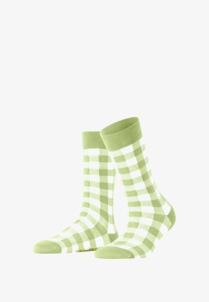 Grün-weiße karierte Socken mit einem gerippten Bündchen, weicher Textur und verstärktem Zehenbereich. Baumwollmischung für Komfort und Langlebigkeit.