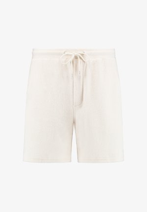 Krótka, kremowa bawełniana szorty o miękkiej teksturze frotte, z elastycznym pasem, z zaciągiem sznurkowym i minimalnymi detalami w szwach.
