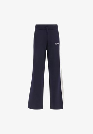Marineblå sweatpants med snoretræk i taljen, med hvide sidepaneler og logo-detaljer. Fremstillet af blødt jersey-stof, vid ben-design.