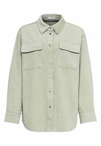 Camicetta in corduroy verde con bottoni sul davanti, due tasche sul petto e colletto classico. Presenta un tessuto testurizzato e bottoni a pressione argentati.