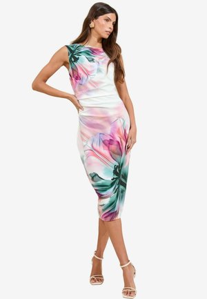 Floral print dress in soft fabric; features pink and green flowers on a white background, fitted silhouette, and knee-length design.