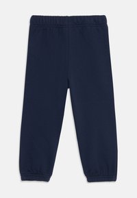 Mörkblå sweatpants gjorda av mjukt material med elastisk midja och samlade manschetter vid anklarna. Enkelt, odekorerat mönster.