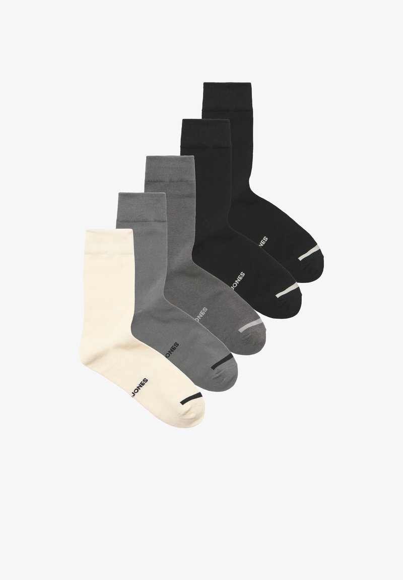 Vijf paar sokken in verschillende kleuren: crèmekleurig, lichtgrijs, donkergrijs en zwart. Gemaakt van een glad materiaal met contrasterende accenten op hiel en teen.