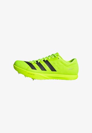 Chaussures de sport vert citron avec une tige en mesh, des rayures noires et une semelle extérieure légère équipée de pointes, conçues pour la performance en épreuves d'athlétisme.