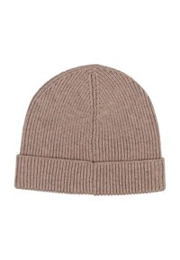 Knitted beige beanie hat with folded cuff and vertical ribbed pattern, displayed on a white background.