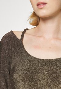 DKNY CUT OUT TOP - Pullover - dark gold/black