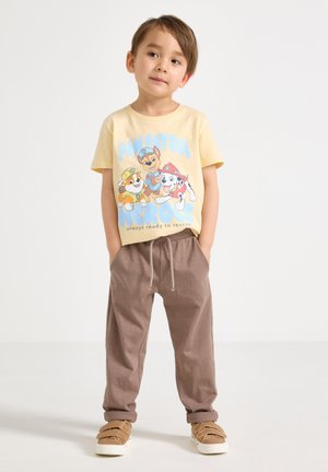 Lindex, PAW PATROL HEROES UNISEX - T-shirt imprimé - light dusty yellow