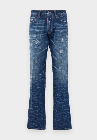 Sinine kulunud denimipüksid, millel on laienev jalg, nööbiga ja lukuga sulgemine, esimesed ja tagumised taskud ning kerge kulumise detailid.