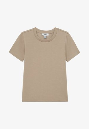 Beżowy bawełniany T-shirt z krótkim rękawem, okrągłym dekoltem, płaskimi szwami i metką marki na tylnej części kołnierza.
