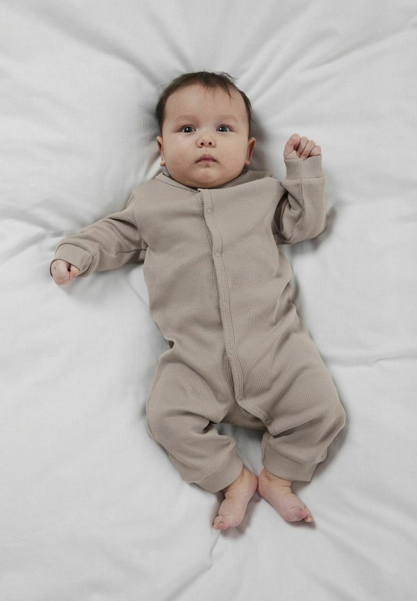 LANGARM - Jumpsuit - string