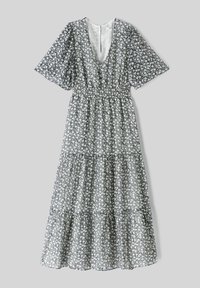 Robe maxi à fleurs avec décolleté en V, manches courtes, taille élastique et jupe à volants. Fond sombre avec imprimé de fleurs blanches.
