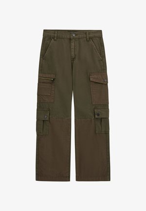 Cargo pants made from durable cotton in dark olive green. Features multiple pockets, a front zip, and a relaxed fit with a straight leg design.