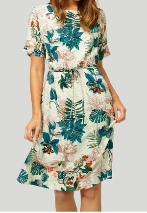 Floral dress featuring a light green background, short sleeves, and a drawstring waist. The design includes blue and orange botanical patterns.