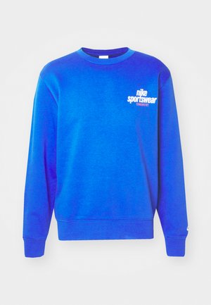 Sweat-shirt bleu en coton, avec un col, des poignets et un ourlet côtelés. Logo imprimé en blanc sur la zone gauche de la poitrine. Design simple.