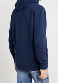 Tommy Jeans Mikina s kapucí - dark blue