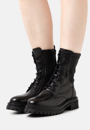 Geox Kotníkové boty na platformě - black