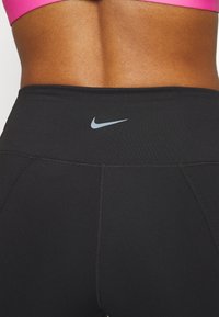 Nike Performance ONE SPLIT HEM - Leggings - black
