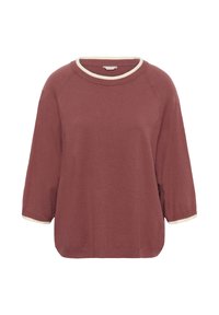 Rozsdabarna kötött pulóver háromnegyedes ujjal, fehér díszítéssel a nyakán és az ujjakon, egyszerű fehér háttér előtt.