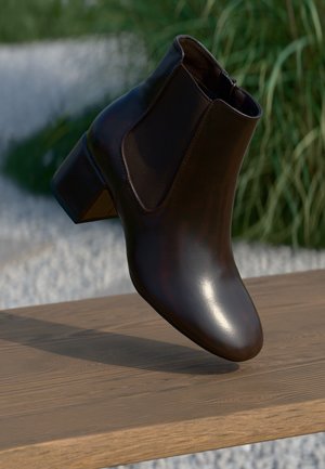 Hnědá kožená kotníková bota s kulatou špičkou a nízkým blokovým podpatkem, s elastickými bočními panely a hladkým, lesklým povrchem.
