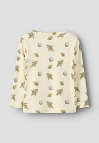 Langarmshirt aus cremefarbenem Stoff mit einem wiederholten Muster von Raketen, Planeten und Ringen in gedämpften Farben.