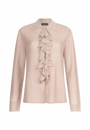 Blusa a manica lunga di un delicato rosa chiaro, con una texture a coste e una patta frontale arricciata, dotata di colletto a punta e chiusura con bottoni.