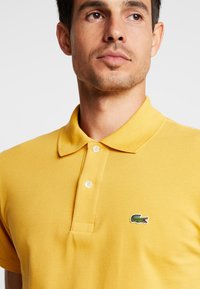 Lacoste Piké - darjali