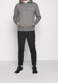 Tommy Hilfiger Jersey con capucha - mottled dark grey