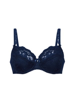 Navy blauwe kanten bh met verstelbare straps, beugelsupport, gegolfde randen en een klein strikaccent in het midden vooraan.