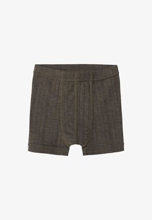 Boxers marron côtelés avec une poche avant contournée et une ceinture élastique, conçus pour un ajustement près du corps et un confort optimal.