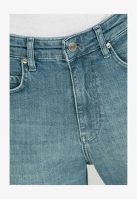 Seleccionado, topaz blue