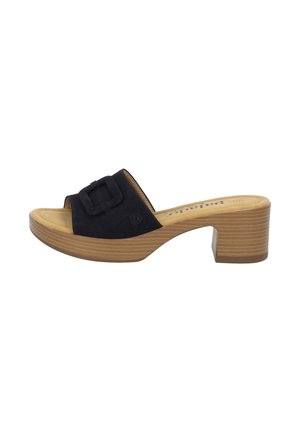 Sabot ouvert en daim noir avec un détail de boucle sur la sangle et un talon bloc beige présentant une texture nervurée.