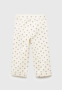 Pantaloni di cotone color crema con piccoli motivi floreali blu, vita elastica, taglio dritto e orli arrotolati.