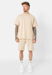 Sixth June ESSENTIEL - Tracksuit bottoms - beige