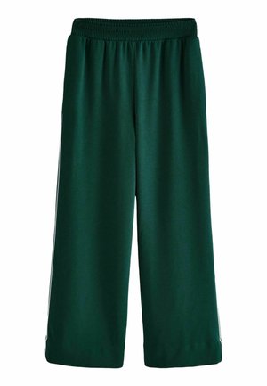 Donkergroene broek met wijde pijpen en elastische tailleband, met subtiele strepen aan de zijkant, ontworpen voor casual of sportief gebruik.