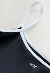 Unselected, navy white