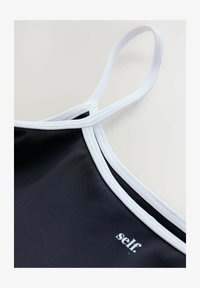 Unselected, navy white