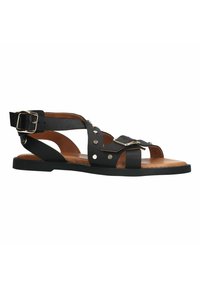 Zwarte leren sandalen met een platte zool, voorzien van een gesp, decoratieve studs en kruisbanden. Open teen ontwerp.