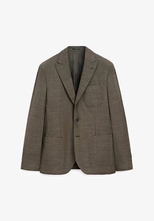 Blazer marron texturé avec une coupe ajustée, fermeture à un bouton, revers crantés et deux poches avant. Détails de motif de tissu notables.