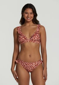 Bikini set met luipaardprint in aardse tinten met ruches. De top heeft een diepe V-hals en verstelbare bandjes op de bikini slip.