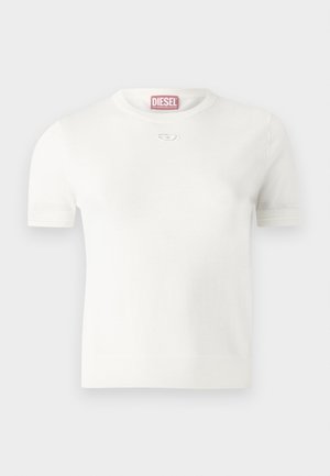 Λευκό κοντομάνικο μπλουζάκι φτιαγμένο από μαλακό ύφασμα με στρογγυλή λαιμόκοψη και μικρή ασημένια λεπτομέρεια logo στο στήθος. Λείο ύφασμα.