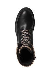 Bottine en cuir noir avec doublure en imprimé léopard, lacets à motifs et semelle en caoutchouc robuste. Dispose d'un intérieur rembourré pour plus de confort.