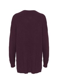 Mörklila oversized stickad tröja med ribbad textur, vida ärmar och rundad halsringning bak. Ingen ytterligare detaljering  är synlig.