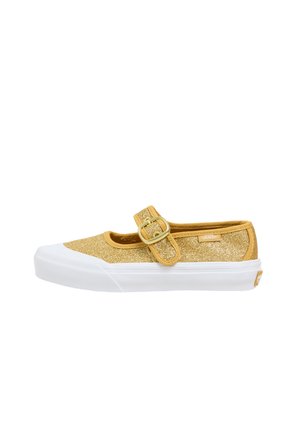 Zapato estilo Mary Jane con purpurina dorada, suela de goma blanca, parte superior de tela y correa ajustable con detalle de hebilla dorada.