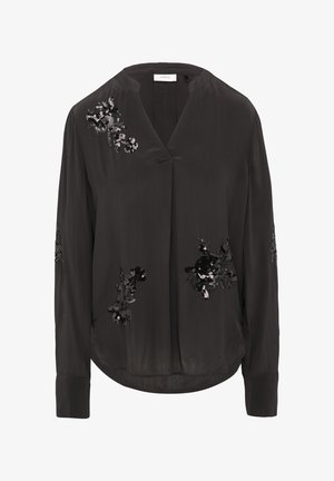 Blouse noire avec un décolleté en V et des manches longues. Présente des embellissements en sequins floraux sur le devant et les manches. Tissu lisse et léger.