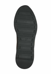 Semelle de chaussure en caoutchouc noir avec des rainures texturées et le numéro « 37 » en relief. Elle présente une forme plate et un motif distinct pour l'adhérence et la traction.