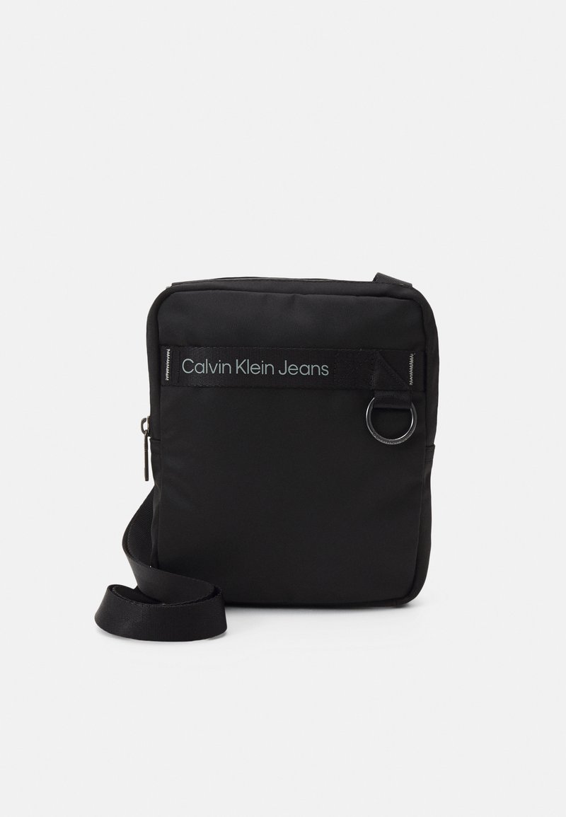 Calvin Klein Jeans ULTRALIGHT REPORTER UNISEX Across body bag black